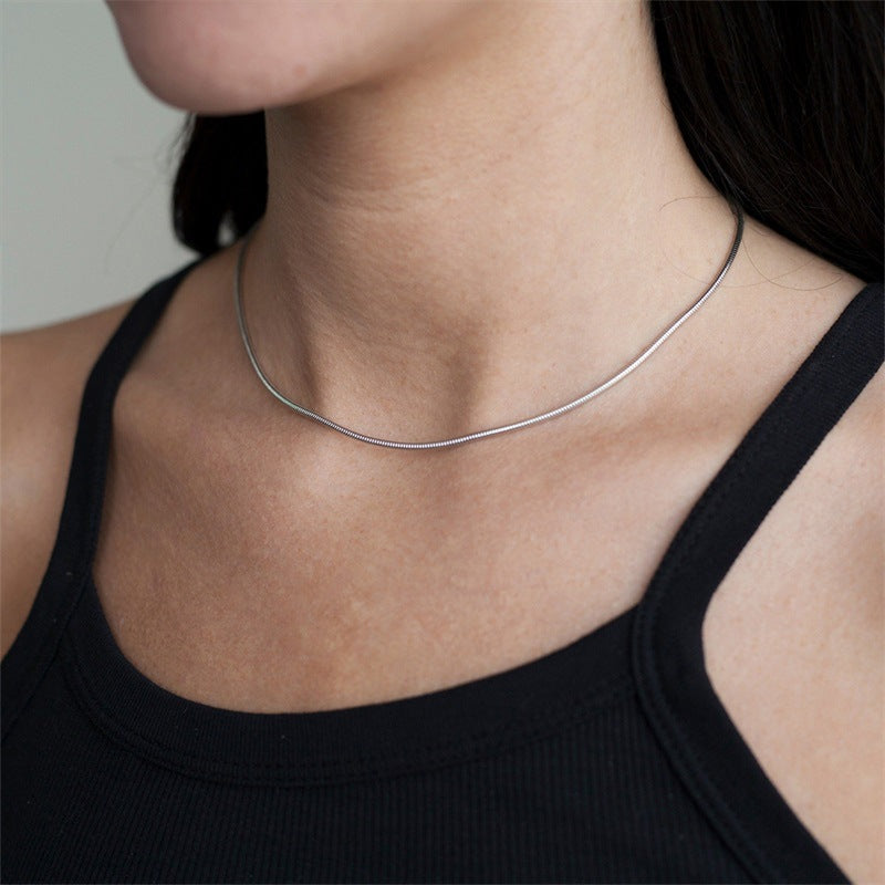 Collares de acero de acero redondo de acero titanio al por mayor